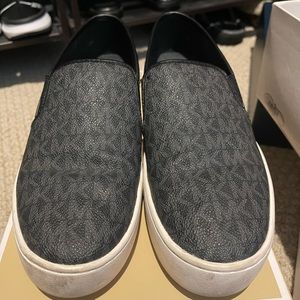 Michal Kors 71/2 black slip on sneakers.